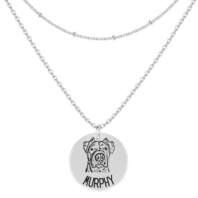 Silver pet memorial necklace with an engraved pet portrait pendant
